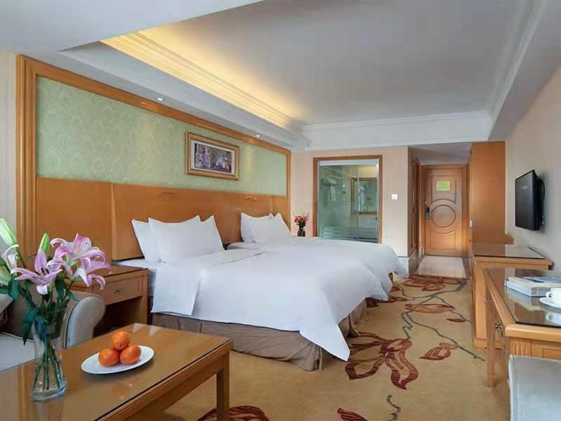 Vienna International Hotel Lijiang Yuxue Avenue Экстерьер фото